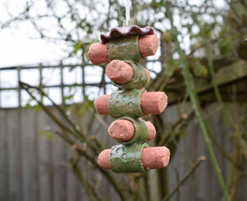 Suet log bird feeder